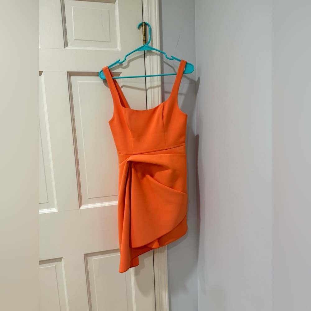 Packer size 4 soft orange cocktail/formal dress, needs dry cleaning